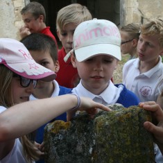 Children from Millfield Primary School in Littleport looked at the fingerprints on the top of Hickathrift's Candlestick